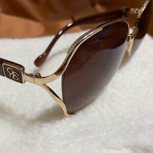 JESSICA SIMPSON GOLD FRAME SUNGLASSES USED WITH CARE